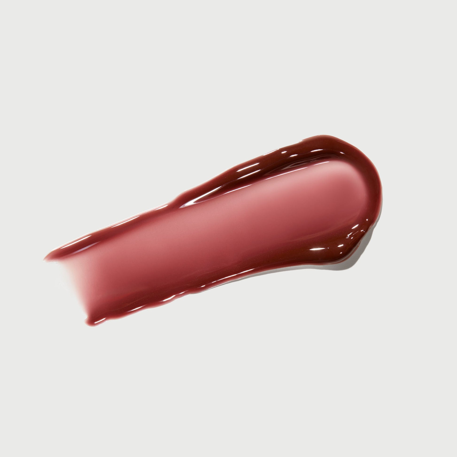 phyto-glow-lip-balm-crimson-d6 NATR-10122-Swatch-Phyto-Glow-Crimson-bonebkgd.jpg