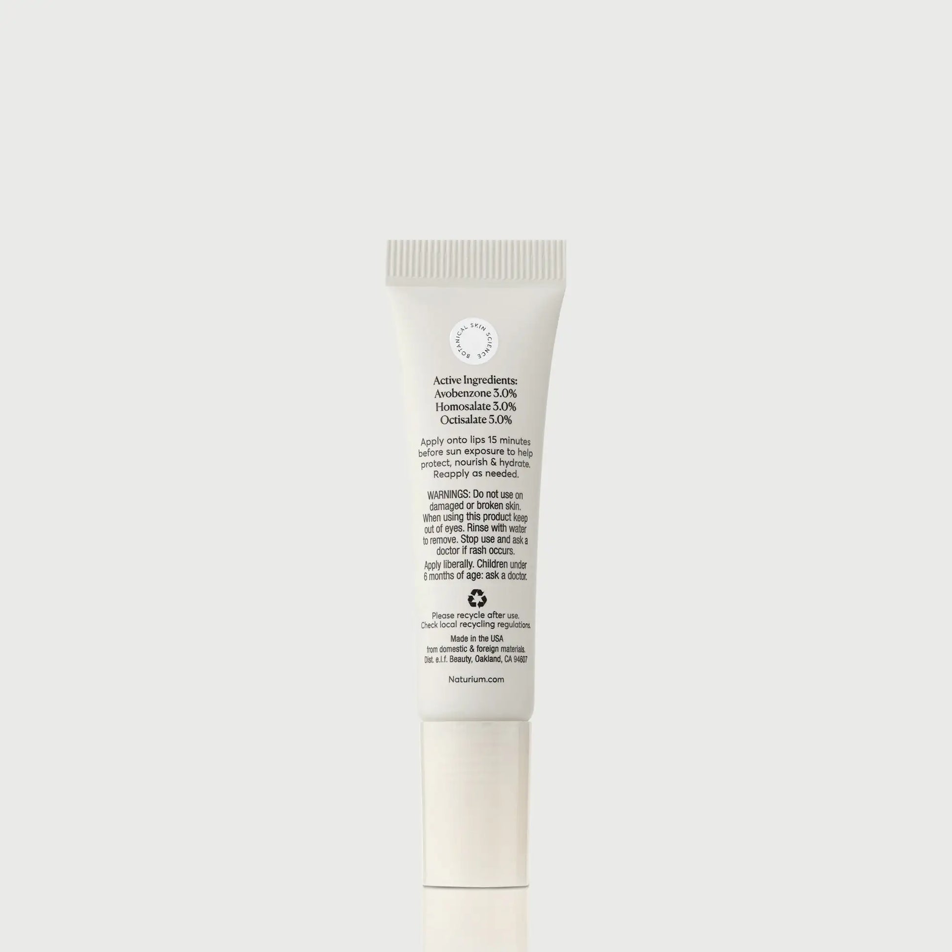 phyto-glow-lip-balm-spf-45-clear-p1 NATR-10124_PhytoGlow_SPF_Clear_primary_capon_back_bonebkgd_1.webp