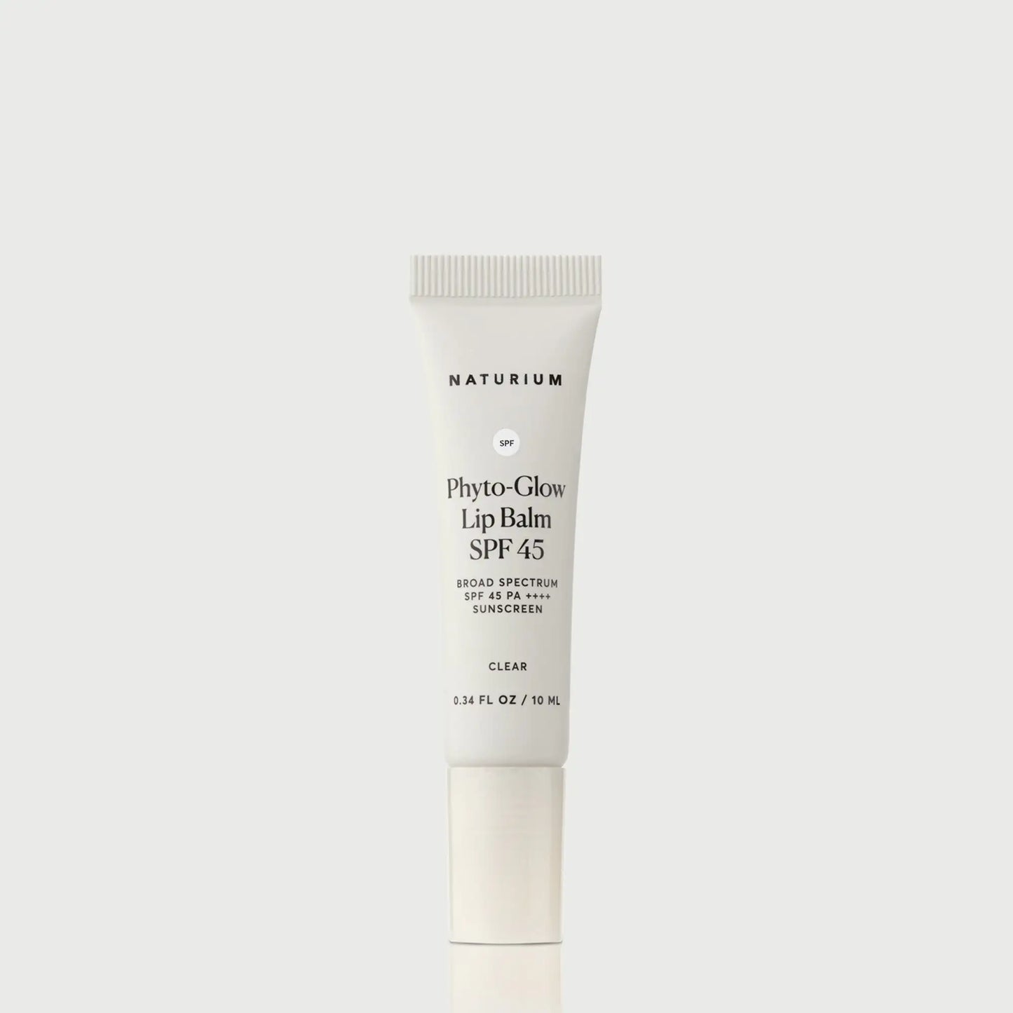 phyto-glow-lip-balm-spf-45-clear-p1 NATR-10124_PhytoGlow_SPF_Clear_primary_capon_front_bonebkgd_1.webp