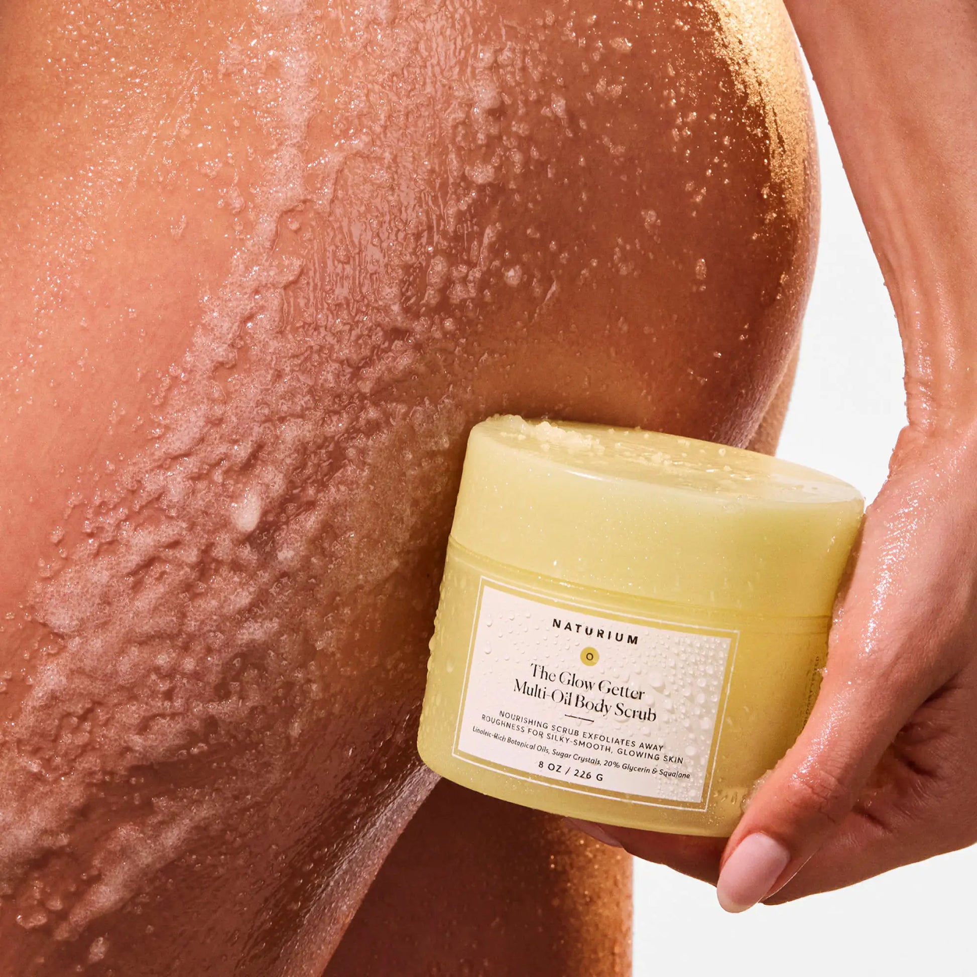 the-glow-getter-multi-oil-body-scrub-m6 NATR-40028-Alt-Image-The_Glow_Getter_Multi-Oil_Body_Scrub-07.webp
