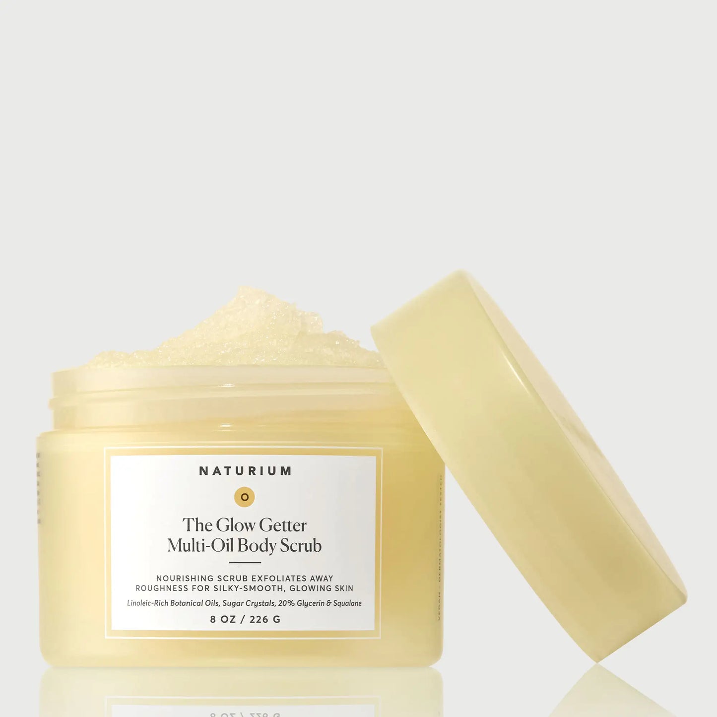 the-glow-getter-multi-oil-body-scrub-m6 NATR-40028-GlowGetter-Multi-Oil-Body-Scrub-Front-CapOff-bonebkgd.webp