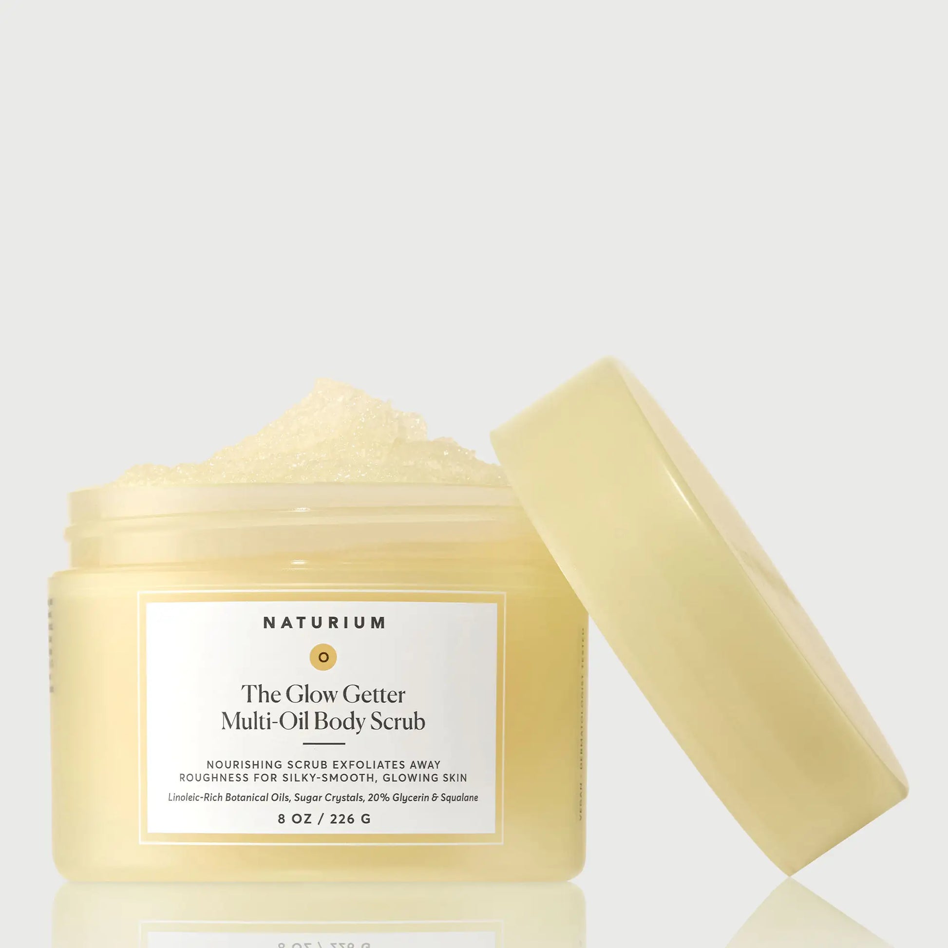 the-glow-getter-multi-oil-body-scrub-m6 NATR-40028-GlowGetter-Multi-Oil-Body-Scrub-Front-CapOff-bonebkgd.webp