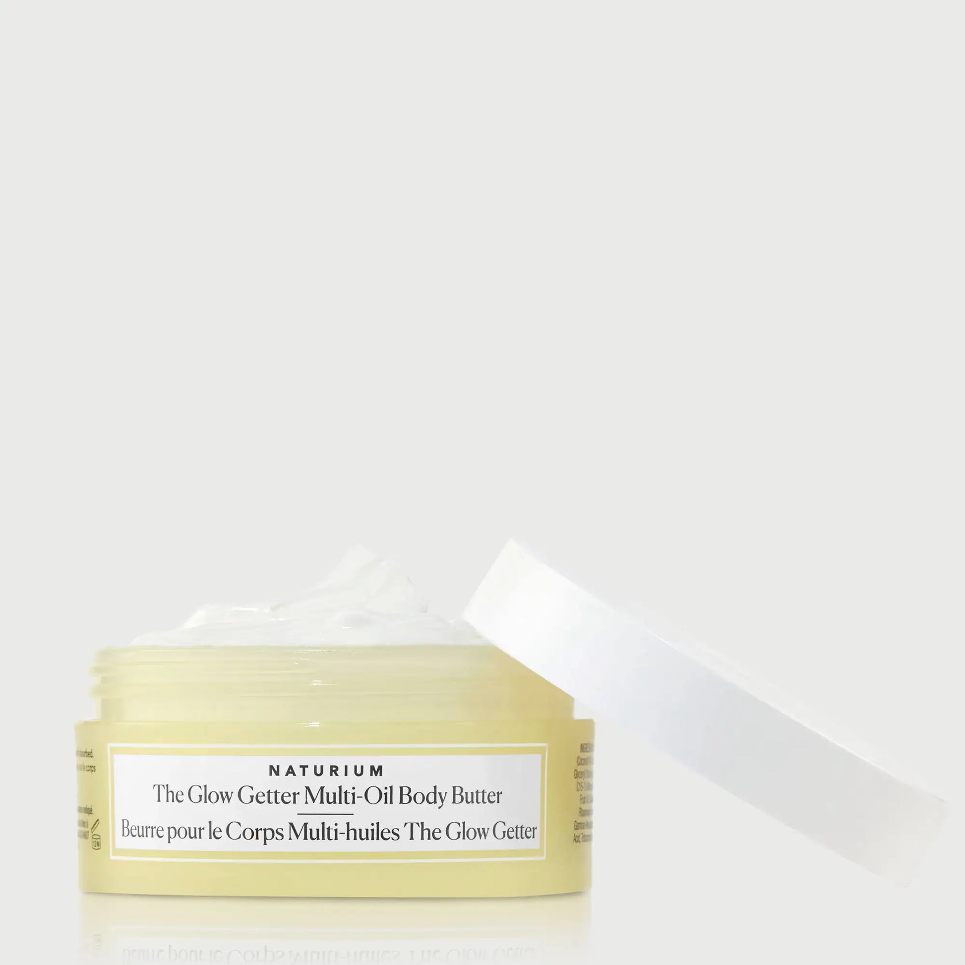 the-glow-getter-multi-oil-body-butter-travel-size-n4 NATR-40115_Glow-Getter-Body-Butter-Mini_front_capoff_bonebkgd.webp